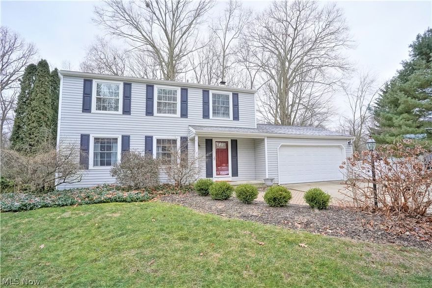 What a great opportunity to own a well-designed home in a gorgeous neighborhood with both a family room & sunroom addition on a private park-like lot! The updated kitchen has honey-stained cherry cabinets, granite counters, tile backsplash, stainless steel appliances & a pantry w/roll-out shelving. The living room boasts hardwood flooring that opens to the formal dining room. The room between the kitchen and family room can be used as a hearth room or simply an additional room & features a fireplace! The family room boasts a brick fireplace (with remote control) & custom built-ins! The 4-season sunroom has a beamed ceiling & offers beautiful views of the private backyard and opens to a deck. There is a half bath on the 1st floor. The 2nd floor features an updated guest bath w/granite countertop, newer tub w/surround, porcelain tile flooring & recent lighting. The master bath offers a beautiful tile shower, vessel sink, granite counters & porcelain tile flooring. The three additional be