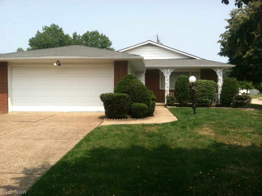 One owner ranch ready for decorators touch and priced to sell!!! New windows thru out. Beautiful hardwood floors in living room and dining room - First floor family room off kitchen with patio doors leading to completely fenced in private yard with built in gas grill. Two baths on main floor with direct access to bedroom. Eat in kitchen. Huge basement with laundry area and glass block windows.Be sure to put this one on your tour!