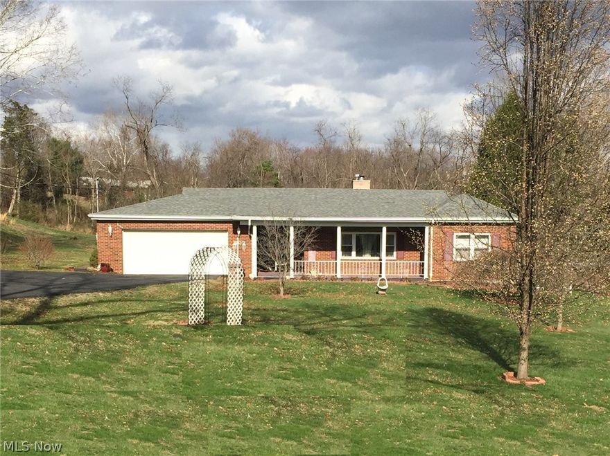 Fall in love with this beautiful brick ranch, 3 bedrooms, 2 full bathrooms located on 1.1 Acres (flat) minutes from downtown. A gorgeous stone fireplace and updated kitchen will welcome you. Lots of updates inside and out New asphalt drive-way in front with parking pad. Screened porch and storage building overlooking large back yard.