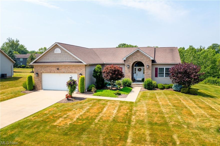 This gorgeous ranch home is situated perfectly on a cul-de-sac, with a backdrop of woods, serenity, and peace. Once you walk into this home you’ll know right away that the owners have taken impeccable care to maintain and make this home an oasis. Master is on the main as well as the laundry and a second and third bedroom making this a true first floor living home. Enjoy main level living with its gorgeous kitchen with cherry cabinets, beautiful granite countertops, and stainless steel appliances.   Off the kitchen, enjoy the 4 seasons room with oversized windows.  Kitchen and 4 seasons room opens up to the living room with it's vaulted ceilings and dual skylights that allow the house to be filled with natural light!   Downstairs walk-out basement with its high ceilings is fully finished and perfect for family or guests!   Basement kitchen is absolutely stunning and perfect for entertaining.  Basement also has a large living area, a dining area, one bedroom, a bonus room that can be use