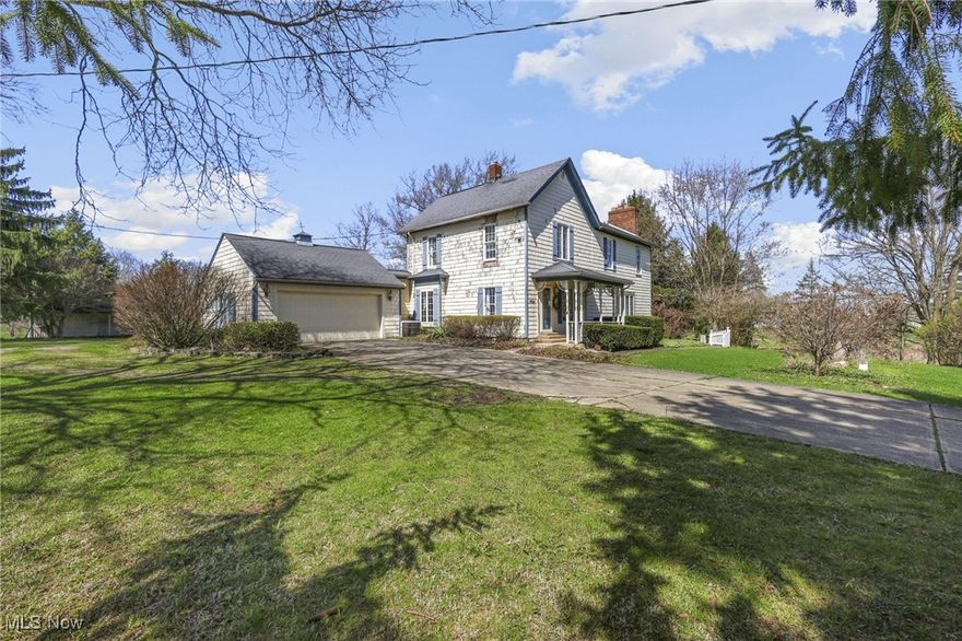 Welome to 13300 Canaan Center Rd., a unique countryside retreat nestled on 8 scenic acres in Creston, OH. This spacious 5 bedroom, 2.5 bath home offers 2552 sf of living space with character and charm throughout.  The original portion of the home, built in 1900, has been thoughtfully expanded over the years, including a significant 2 story addition in the late 1970's that included new kitchen with walnut cabinetry, granite counters; family room, laundry area and full bath on the main floor plus 3 bedrooms on the 2nd floor.  Inside, you'll find in the family room a cozy, full wall, wood burning fireplace with solid stone architecture (believed to be African black stone) perfect for Ohio winters, as well as a formal dining room, spacious living room and a mud room off of the attached garage with bonus walk up storage space. Also updated: furnace 2018; 8 newer Anderson windows.   This home has 2 separate basements, original and newer block addition with 2nd fireplace, offering plenty of storage and functionality.  The outdoor space truly shines with a 4 bay, 53x32 pole barn with 3 - 8 foot overhead doors and a 12' overhead door for large vehicle parking.  You will also have plenty of additional storage in the 32x40 pole barn, complete with a 20x40 space offering endless possibilities for farm, workshop or recreational use. Whether you are seeking a hobby farm, rural homestead or a peaceful country lifestyle, this property delivers.  Don't miss your chance to own this one-of-a-kind piece of Wayne County countryside!