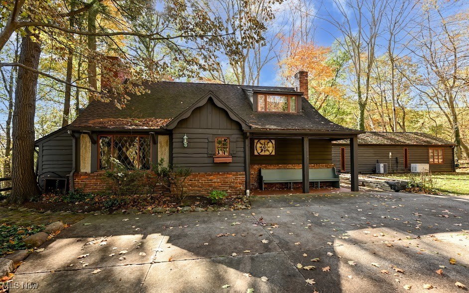 This stunning, picturesque, private location is right out of a story book! Welcome home to this 3 bedroom, 2.5 bathroom cottage style home with 1+ car garage, strategically positioned on gorgeous, wooded 3.2 acres! Single story living. The two full bathrooms have been remodeled and both provide walk-in showers. Two fireplaces! Updated kitchen with plenty of counter space and cabinetry, all stainless steel appliances and granite counters. The main entry leads to a grand living room with rare wormy chestnut trim, custom built-ins and a cozy fireplace! Large 4 season room leads to a stone patio that is situated perfectly to watch and listen to nature come alive. Comfortable family room with fireplace would make a fantastic study, TV room or library! Plenty of space and storage throughout. Whole house generator remains for piece of mind and ease. This is the perfect opportunity to own your slice of Heaven. Schedule your showing today.