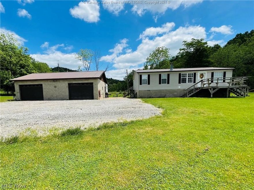 Nice 3 bedroom, 2 full bath manufactured home that is surrounded by wildlife & nature with a private setting! Nestled on 3 acres of flat land, 30x40 2 car heated detached garage & storage building! Home sits on a complete concrete pad which offers lots of storage also & has a permanent foundation. Some updates include metal roof & heating/cooling. Well maintained over the years & ready for a new owner!