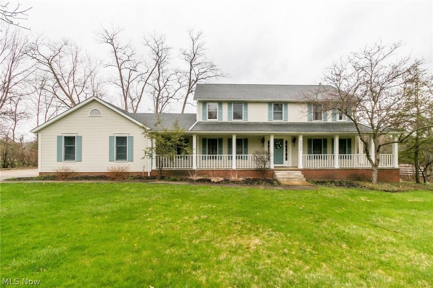 Pride of ownership abounds in this lovingly well maintained 4 bedroom colonial w/ wrap around front porch and a 3 car garage. Neutral decor throughout, the interior boasts oak trim, gleaming hardwood floors and loads of natural sunlight. The lovely foyer will greet your guests and leads to formal living and dining rooms with beautiful hardwood floors. Spacious eat-in kitchen w/ ceramic tile floors, ample cabinet/counter space and all appliances stay. Picturesque views of the beautiful back yard from both the kitchen and family room which is complete w/ a brick faced wood burning fireplace. First floor office and convenient mud room/ pantry. Vaulted master bedroom w/ en-suite bath and walk in closet. Nicely appointed bedrooms. The finished walk out lower lever features a sprawling recreation room, exercise area, storage room and a large laundry room. The elevated rear deck can be accessed through french doors from the kitchen and overlooks the absolutely gorgeous back yard and pond. Thi