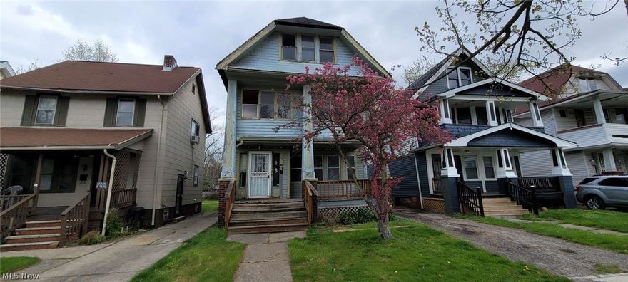 Spacious duplex in the heart of E Cleveland.  Total of 5 bedrooms and 2 bathrooms.  Full shared basement.  Tons of potential.