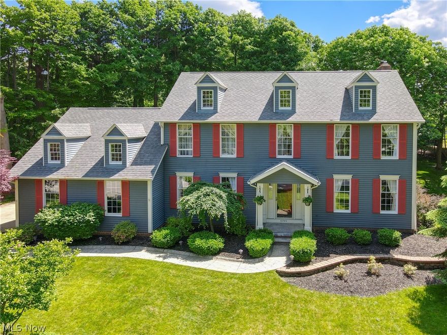 Beautiful home located close to all Hudson amenities! This home is meticulously maintained and has had many updates throughout. The entry way is flanked by the dining room and a formal living space that can be used as a home office or playroom. Step down through the French doors and enter into your large family room with gorgeous windows that overlook the private yard. The eat in kitchen has been updated with cream cabinets, granite countertops and stainless-steel appliances. Off the back is a beautiful sunroom with vaulted ceilings and tons of natural light. A large mudroom is off the garage with custom built-ins and laundry. A half bath completes the first floor.  Upstairs you will find a tasteful primary bedroom and you will love the updated bathroom with double vanity, walk in tiled shower and walk in closet with custom organizer. Three more bedrooms have great closet space and share the hall bath that has been updated with a newer vanity and tiled shower.  The basement has great use of space with a large rec room, another room that can be used as a guest space or home office and another full bathroom!! Outside is a large yard that backs up to the hiking/biking trail and has a French drain.  The deck overlooks the quaint brick patio, perfect for summer nights! AC-2023, Water tank- 2024, Dishwasher- 2023, Flooring in kitchen/half bath-2024.