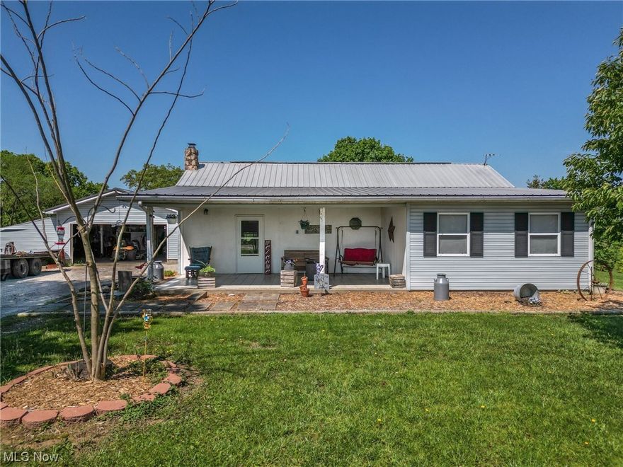 Absolutely stunning 7+ acres with Ranch home, two car garage, and large barn.  The barn has been totally remodeled to include electricity, a new roof, all-new exterior walls, and a unique door for goats! Next to the house is a nice flat lot, the perfect place to build another house, or put a mobile or modular home on for family or additional rental income. The two-car garage is heated and updated with two additional rooms, making it perfect for storage and a year-round workshop. Relish the enchanting views of the surrounding countryside from your front or back porch. The land also allows you to hike, ride ATVs, hunt, or sit in the deer stand and take in the peaceful wooded views. Enjoy the already-growing Ginseng & blueberries, and there’s plenty of room for a nice garden. In addition to the garage and barn, many updates have been made including remodeling of the front porch, new back patio, new stove, new washer, and new outdoor wood stove. Call and schedule your showing today!