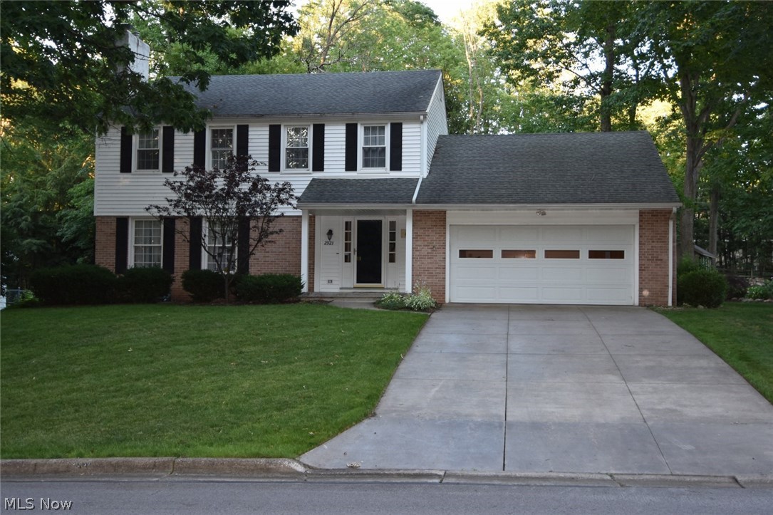 Welcome Home to this very nice and spacious 4 bedroom, 2 1/2 bathroom colonial in Woodridge school district! Living room with fireplace flows into the dining room. Open kitchen/eating area features plenty of cabinet and counter space, pantry, and newer stainless steel appliances (double ovens, refrigerator, microwave & gas stovetop range)! Powder room; family room with access to the 3 season sun room with door to beautiful backyard and patio.
All 4 bedrooms are spacious and offer nice closet space AND it is believed there are hardwood floors under all the bedroom carpeting. The master bedroom has a full bath with walk in shower. Another full bath with newer tub and enclosure and a storage room complete the 2nd floor. Recent updates include newer furnace and AC (approx. 2012), roof (approx. 15 years with 40 year shingle), newer windows, Nature Stone in attached garage, newer front porch and sidewalk. Full basement can be easily finished and can be sectioned off into different