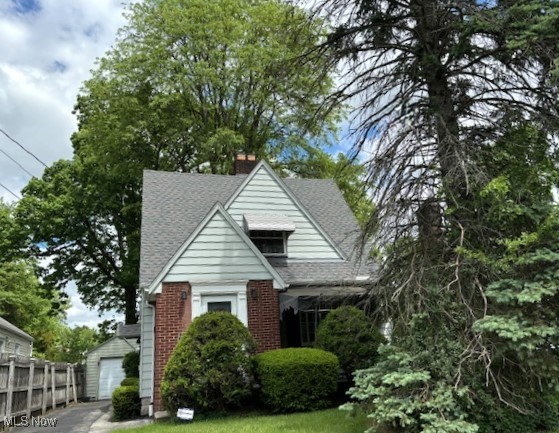 2 Bedroom doll house with many updates in 2025! The cozy entry has a beautiful wood door and a coat closet. The huge living room features a very nice wood burning fireplace and open staircase to the second floor, right around the corner is a dining room with a cute built-in cabinet with glass doors for dishes and glasses.
The remolded kitchen has a newer butcher block counter top, sink/faucet, backsplash, GFI, new tiles on the floor and walls, stove and refrigerator stay. 1/2 Bath on 1st floor has newer ceramic tiles, new toilet and sink. There is a full bath on the second floor that is also updated. The upstairs windows and roof were replaced in 2017, hardwood floors through out except for kitchen and bath. 1 car garage.