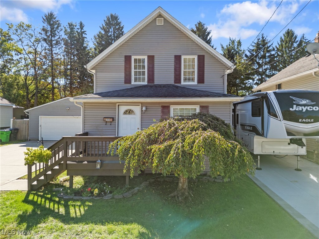 Welcome home to this beautifully maintained Colonial in the heart of Mogadore! Offering 1,104 sq. ft. of inviting living space, with 2 large bedrooms and one bath, this charming home blends classic character with modern comfort. Inside, you’ll find a bright and open layout featuring a spacious living area, a fully applianced kitchen, and a flexible first-floor room—perfect as a small bedroom, office, or hobby space. Updates like vinyl siding, new LTV flooring, and fresh paint make the home move in ready!. The full basement is waterproofed with a transferrable guarantee and offers plenty of extra space to take advantage of! Outside, enjoy the fully fenced backyard, a huge deck and a large 2-car garage, with an extra-wide concrete driveway providing plenty of parking. Located within the Mogadore Local School District, this move-in-ready home offers comfort, convenience, and small-town charm all in one package.