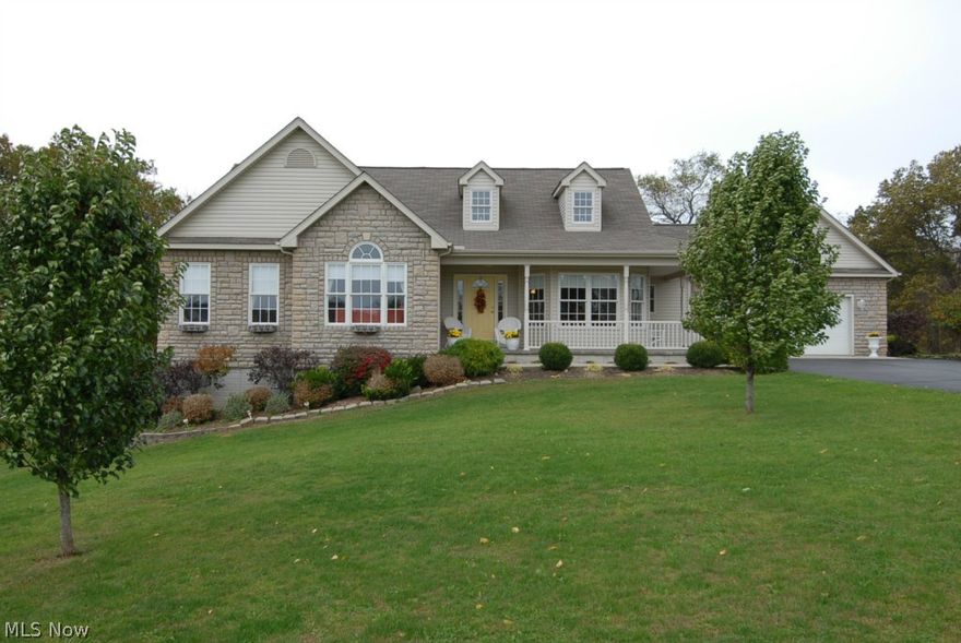 Beautiful ranch on 3/4 acre lot at end of cul de sac.  Quality built home offers vaulted ceilings, Brazillian Cherry floors, granite counter tops, stainless steel appliances, large windows for ample natural sunlight, partially finished walk out lower level and much more. Lower level Sq Ftg not included on listing.