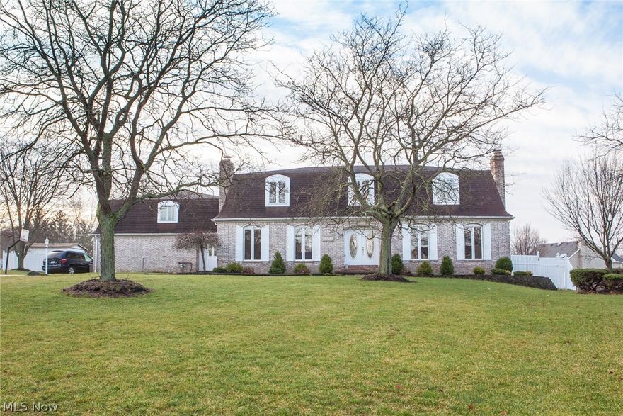 If you're looking for a large but affordable home then here it is! Over 4200 sq feet found in this elegant all brick french colonial with unique floor plan. Located in the heart of North Royalton and all on large, private fully fenced gorgeous lot - Quality shows throughout this spectacular well cared for home! Spacious neutral kitchen with cabinets and countertops galore and open to the eat in breakfast area. From the breakfast area access the back patio which is perfect for entertaining! Huge beamed family room with a beautiful fireplace. Formal dining room with glistening just refinished hardwood floors and spectacular bay window which overlooks the scenic backyard. Large living room has french doors and an absolutely gorgeous marble fireplace! Don't miss the private master retreat with large master bedroom, great design of the master bath area-jetted tub, steam shower, separate dressing area and his and her separate closets too! Lots of updates throughout including fresh interior p