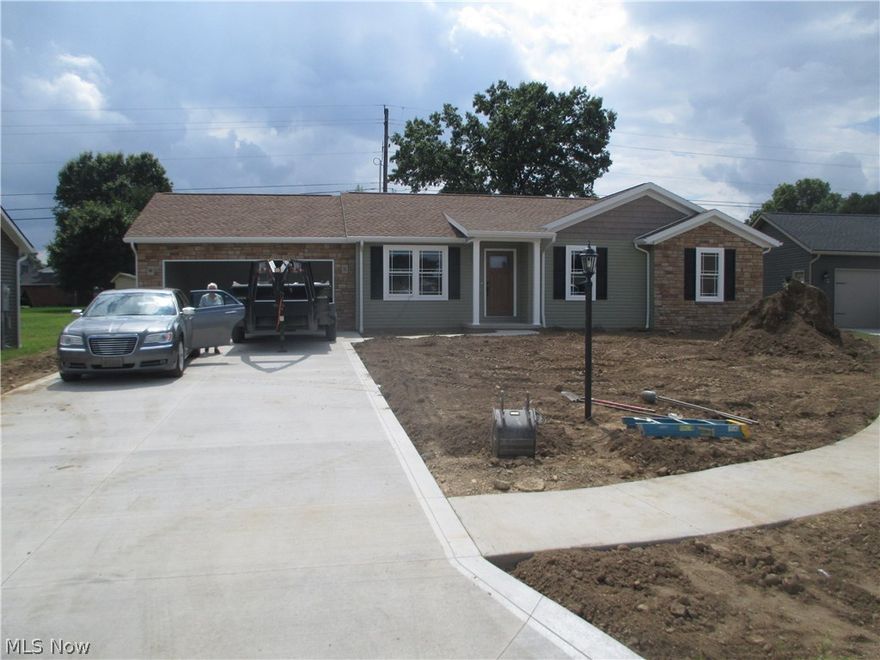 Brand new, quality built, stone and vinyl ranch.  Open floor plan.  First floor master bedroom with full bath and walk in closet.  First floor laundry room.  Covered porch.  Attached 2 car garage.  Excellent south side location.  Taxes reflect the land only.  Square footage is an estimate.