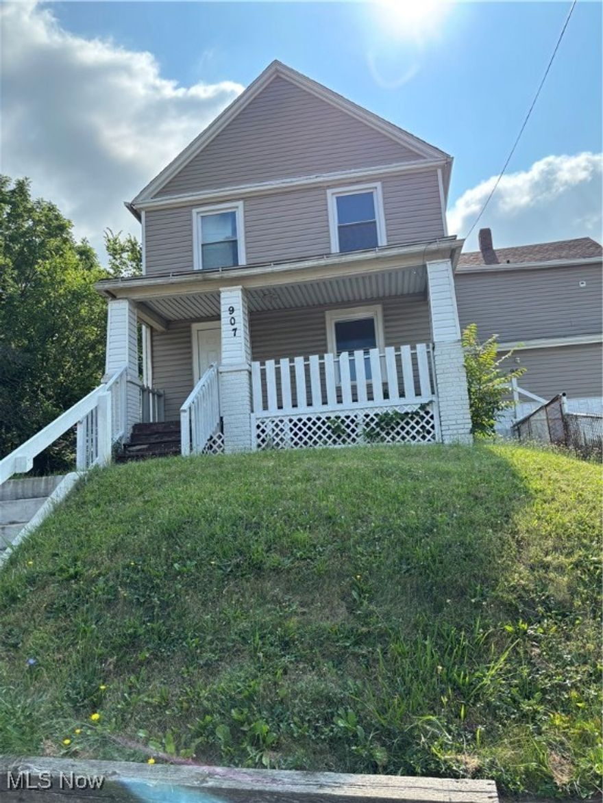 Great investment property in the Heart of Akron. 4 one bedrooms units with 4 Baths and one 4 bedroom house attached. Plumbing and Electrical need replaced. The interior needs cosmetic work thru-out. Great fixer upper for smart investor. Minutes away from Downtown Akron, University of Akron and Expressway. 5 electric boxes. Owner pays Water and Gas. Great curb appeal with big extra lot. Call for your private showing today!!!