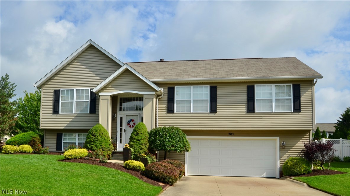 Welcome to 761 Sturbridge Dr.! This updated raised ranch has 3bdrms with a possible 4th bdrm with 2.5 baths and boats over 2,300 sqft! This house is meticulous and you will take notice the minute you walk in the front door! The main level has newer wood flooring in the dining room, kitchen, and the family room. The vaulted ceilings in the family room provides a very spacious yet cozy feeling with a fireplace. Just outside two of the bedrooms is a spacious full bathroom with newer tile flooring. The large master bedroom provides plenty of space to accommodate any of your furniture with a large, walk-in closet. You also have your own master bathroom with newer tile flooring! Just off of the eat-in kitchen is the deck that overlooks the large, fully fenced back yard. Did I mention that it has a newer patio as well!? It is perfect for entertaining! The lower level was recently finished and it is awesome! I mean, look at the pictures, they speak for themselves! You'll also notice the home o