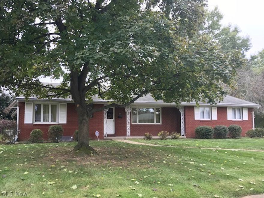 Well cared for 2-3 bedroom brick ranch on large lot.  Desirable location behind Crater Stadium.  Eat in kitchen, appliances stay, but are not warranted.  First floor living room and family room.  Family room has wood burning fireplace and access to covered patio.  Most vinyl windows.  Furnace serviced and new coil and condenser unit on air conditioning 2018. Whole house has gutter guards.  Storage shed will stay. Property sells "As Is"