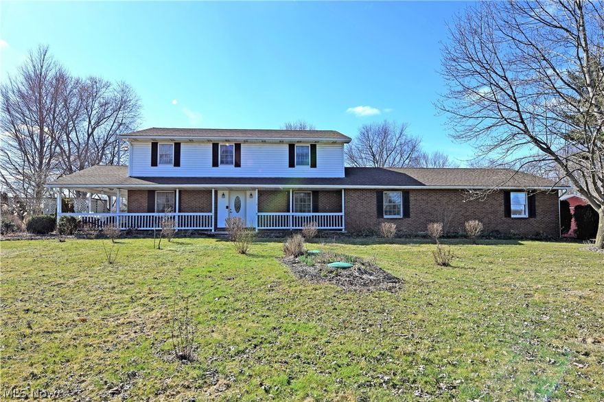 This beautiful rural home has more than enough room for your growing family! With five large bedrooms offering plenty of personal living space and a pool out back, this one is not to be overlooked! An expansive kitchen area boasts large tile flooring and tons of counterspace along with a foray of natural wood cabinetry and appliances staying. An offset walk-in full pantry provides even more storage. The formal dining room features hardwood style flooring with accenting chair rail and crown molding. Relaxation time can be spent in either of the two spacious, living/family rooms. Both rooms offer newer carpet and large windows perfect for letting in natural light. First floor laundry room with washer and dryer staying includes a half bath with new vinyl flooring. The first floor bedroom that is currently used as an office gives access to the side covered porch leading to the pool area. A full bathroom is also found close by with new vinyl floors. Upstairs offers a spacious master bedroom with a private full bath, three additional nicely sized bedrooms with great closest space, and another full bathroom. The extra wide hallway gives room for a desk or sitting area. A full basement means room for rec space and big storage. Outside, a large outbuilding compliments the attached two car garage with extra deep bays. The outbuilding has concrete floors, electric and room for 4 cars. Septic new in 2013, roof 2008, furnace/AC 2006, and so much more! All this and 2-10 Home Warranty!