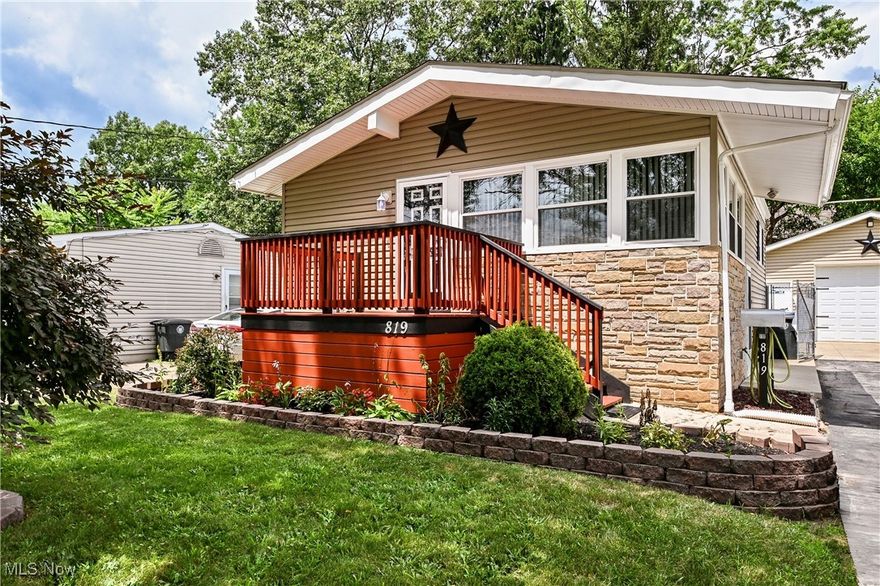 Check out this beautifully updated raised ranch home with a huge 2 car detached garage with quick access to US-224 and beautiful Portage Lakes!  Upon walking in you will notice the beautiful modern light fixture, updated and neutral paint and new plush carpet.  Upstairs you are greeted with a large double coat closet, an open living room with a vaulted ceiling that is surrounded by windows and flooded with natural light.  The completely renovated kitchen offers an industrial/modern farmhouse feel and offers brand new appliances, a farmhouse sink and ample cabinet space.  The upstairs bathroom has new flooring and updated paint and lighting. The upstairs bedrooms are finished with plush carpeting and offer good closet space.  The lower level offers two bedrooms, a full updated bathroom that boasts new paint and flooring and a laundry/utility room.  The furnace and A/C units are also new!!!  The backyard is fully fenced and the huge, detached 2.5 car garage is a hobbyists dream with 10 foot ceilings and is complete with a lift!