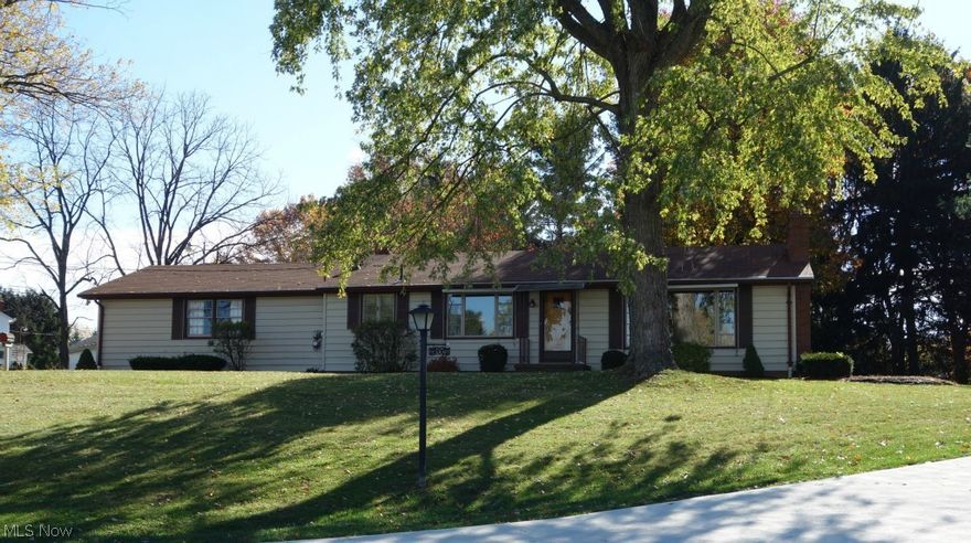 Location is everything! Nestled in established neighborhood and up high enough to have beautiful views of Jackson township. Large living room with pretty, stone fireplace greets you as you walk in the front door. Open eat-in kitchen is perfect for the growing family. Looking for a master bedroom with a private master bath, this home has one! The lower level adds additional finished living space and has a fireplace to cozy up to! Sellers remember playing in the yard as kids and said it was a great place to run and play ball. The two car attached garage leads right into the kitchen making grocery day easy! Convenient to shopping and in Jackson Local School District.