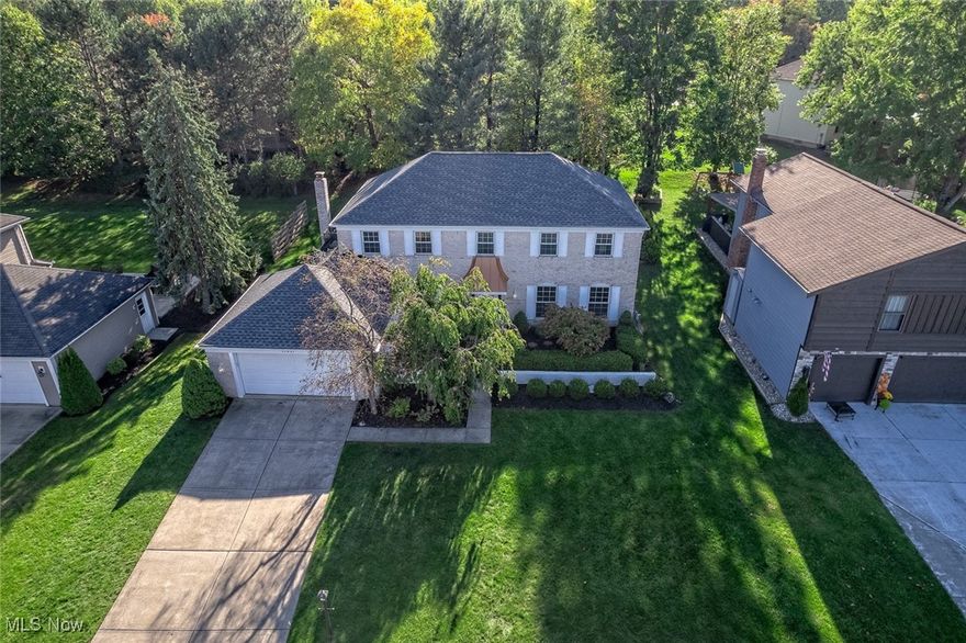 17421 Lexington Lane is a delightful brick front Colonial nestled on a quiet cul-de-sac street in Strongsville's sought-after Highpoint community. This lovingly maintained home has over $200k in updates & ready for you to move in & make lasting memories. As you approach, the beautiful brick façade & lush landscaping create an inviting first impression; plus a brand new roof w/lifetime transferable warranty & gutters just installed October 2024 for added peace of mind. Step inside to the inviting 2 story foyer that welcomes you to a world of comfort. To the side, a private den/study is perfect for work or quiet reading, while the living room & formal dining room provide ample space for family gatherings and celebrations. The heart of the home is the eat-in kitchen, featuring granite counters, stainless steel appliances, plenty of pantry space, refinished white cabinetry and dining area. The cozy family room, with its charming brick fireplace and beamed ceiling, is an ideal spot for movie nights or casual gatherings. Completing the main level are the convenient powder room, laundry room & a coat/shoe nook. Venture upstairs to discover 4 comfortable bedrooms & 2 updated full bathrooms. The expansive owner's suite provides a private balcony, walk-in closet & updated en-suite bath w/ granite top vanity & custom tiled walk-in shower. The partially finished basement adds even more recreation space w/ a bar area & ample storage. Step outside to your beautiful backyard, where a custom stamped patio, refreshed landscaping & deck area provide the perfect setting for summer barbecues or quiet evenings. 1 year home warranty included for peace of mind! This home is ideally located near all of Strongsville's fantastic amenities. Highpoint community clubhouse, playground, pool, walking trails, tennis & basketball courts. Experience a vibrant community life while having a sanctuary to call your own. Come see how this home can be the perfect backdrop for your family's next chapter!