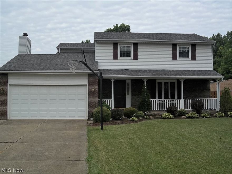 Come and see this fantastic Amherst Township home.  Come up the landscaped front walk to a covered, railed porch then enter into the foyer of this special home.  A large living room guides you to a formal dining room that also is adjacent to the kitchen and a Florida Room.  This layout is perfect for entertaining for birthdays and holidays. The kitchen has been updated with granite counter tops and wood like laminate flooring. The kitchen opens to a family room that features a big fireplace flanked by bookshelves.  The front door in this room leads to a 2 car garage and the back door leads to a deck and a great fenced in back yard.  There is a awesome 24 x 27 foot building with oversized garage door. The building has its own electric box.  Back in the house there are 4 big bedrooms.  The master and has it's own bath.  The furnace and AC were brand new in October '17.  The home also has a full basement.  There is an extra section of driveway for plenty of parking.  This is a great place