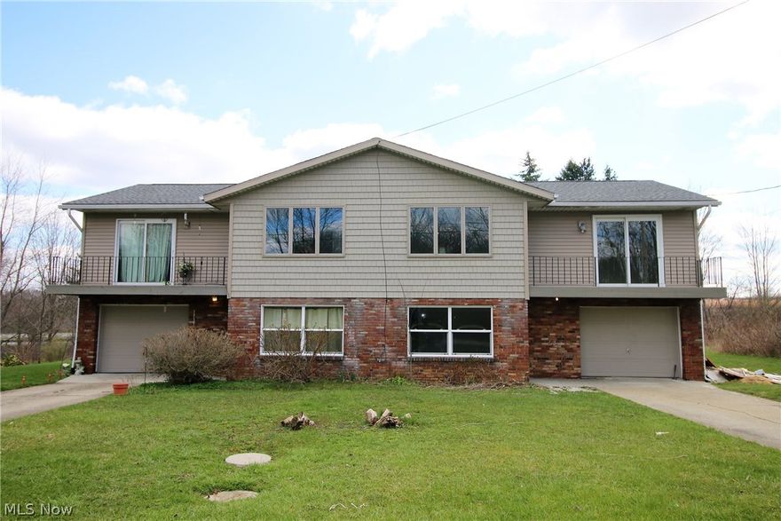 A rare find in Norton. Great investment or owner occupied rental. 2 unit in residential neighborhood on cul-de-sac street. Both units have living room, kitchen, family room, 2 bedrooms, 1 bath and 1 car garage. Many updates include some new windows 2016, front siding 2016, fresh paint and flooring 2016, H20 tanks 2015 and 2013, A/C 2008, Roof and garage doors 2013. All appliances stay with the exception of washer and dryer.  Both tenants are on a month to month lease so options are left open for the new owner.