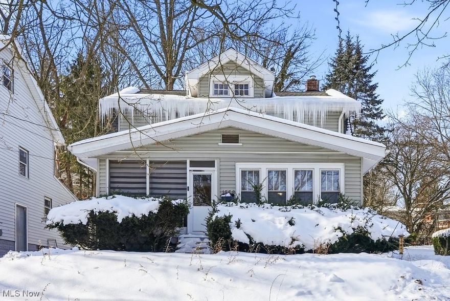 Come see all this charming colonial has to offer while searching for your new home! Lots of character with the built-ins, hardwood flooring, arched doorways, and charming woodwork which are exactly what makes this house feel like a home! When you head up the front steps you will enter in through the enclosed porch perfect for enjoying coffee and a cool breeze in the nicer weather or just a great place to kick off your boots and keep your living room carpet nice and clean when it's mucky outside. You have plenty of room for relaxing around the cozy fireplace in this living room and a bonus sun room walled with windows to make an extra sitting room, office, or even playroom. Continue on into the dining room with large built-in window seat and then the kitchen with beautiful tile flooring and the cutest morning room for grabbing a quick breakfast on a busy morning! Upstairs you will find 3 good sized bedrooms, more built-ins, hardwood floors, crown molding, and a large updated bathroom. In the water proofed basement there is a laundry area, plenty of storage space, and an additional 1/2 bath. Head out to the backyard and find a nice fenced in space for the pets or little ones and a patio for grilling and enjoying the sunshine!! This home is truly ready to move right in, make sure to add it to your list and come see for yourself!! Furnace 2017, AC 2022, Range 2025, Roof approx 15 years old.