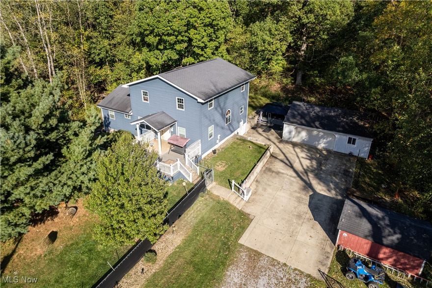 Tucked away towards the end of a private dead-end road, this nearly 3,000 sq ft modern conventional home delivers exceptional seclusion without sacrificing convenience. The 2013 build features a thoughtful two-story layout designed for comfortable living and a first floor master bedroom and walk in closet. The spacious second floor boasts three good size bedrooms, also with walk in closets, and don't forget about the rec room in the basement, complete with bar and pool table. Step outside to your personal 4-acre retreat, where 3 acres of woods (complete with an exceptional deer blind and 4-wheeler trails) provide the ultimate privacy. An outdoor hot tub offers a perfect spot to relax and unwind, surrounded by the sights and sounds of nature. All of this is located just a quick 10-minute drive from town amenities. Ashland City school district. Agent related to seller.