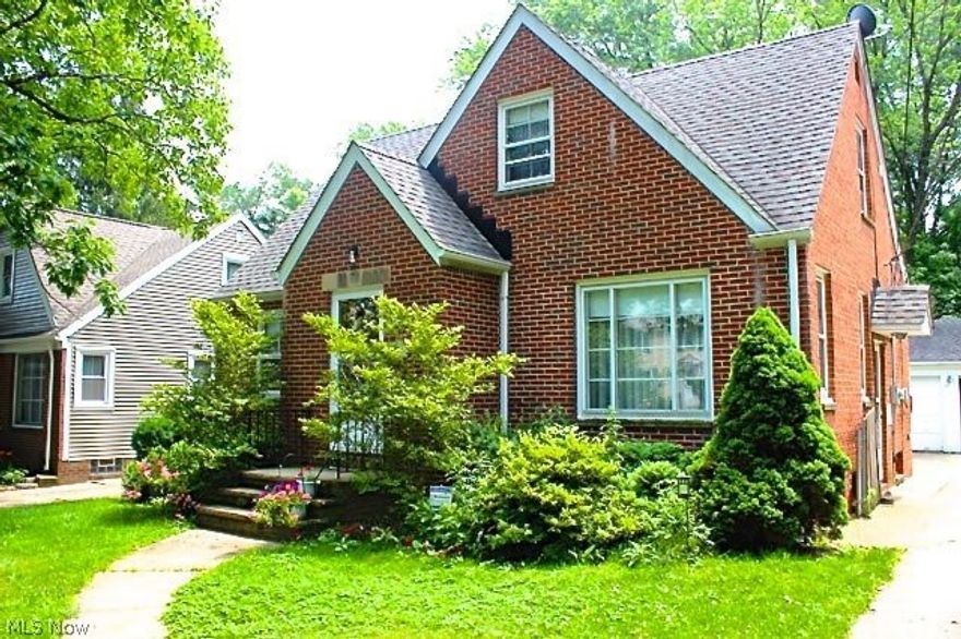 This is a lovely home on a quiet street is full of upgrades.  Move right in!  Three updated full baths. Beautiful tile work. The kitchen has been completely remodled with ceramic tile, new cabinets and granite counter tops, new lighting, stainless steel appliances (stay).  Hardwood floors grace the formal dining room and living room and first floor bedroom.  The upstairs can be your Master Suite... large bedroom, full updated bathroom, and a potentially large walk-in closet.  The basement is finished and makes a perfect playroom. The roof is only a few years old.  Brand new furnace.  There is literally nothing to do but bring your furniture.  The park-like backyard is fenced in and is perfect for entertaining. The 2-car garage has a covered patio attached. This is an exceptional home.  Come see it today!