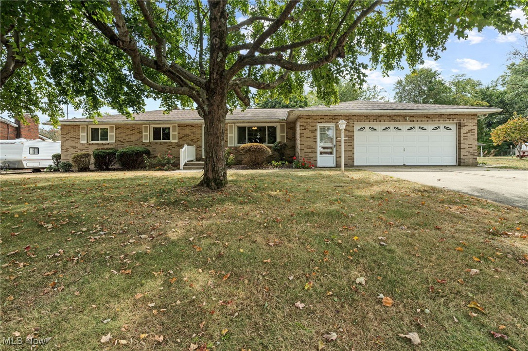 Welcome to 3310 Linden Street! This well maintained home has been meticulously cared for and it shows. Located in Lake Local Schools, this desirable Ranch style home offers three bedrooms and 1.5 baths all while offering both city water and city sewer. Walk into the spacious living room with all natural wood flooring, beautiful patterned ceiling with newly added light fixture plus convenient coat closet. The eat-in kitchen offers a lovely dinette area overlooking the almost half an acre lot, gas range, built-in oven, refrigerator and newly added dishwasher and disposal. Three Nice sized bedrooms offer fantastic closets, deep linen closet in the hallway and full bath with a tub/shower combination. Family room sits in the back of the home and offers cozy vibes with a fireplace and built-in book shelves all while leading out to the 12 x 17 sun room with natural light throughout: a perfect space to watch the seasons change while enjoying your morning cup of coffee. The basement is clean and unfinished offering ample storage space, a new 100 amp electrical panel, washer, dryer plus an additional shower and sink. The all brick exterior is sure to impress along with the two car garage with awesome storage plus the large shed in the backyard. Home has updated paint and GFCI outlets throughout (as well as the shed), and replacement windows. All this plus a dead-end street. Wow! See this lovely home today!