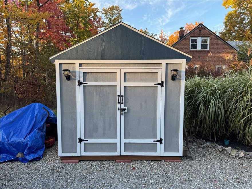 Nestled on a quiet dead-end street in the highly desirable Orange School District, this beautiful 4-bedroom, 4.5-bathroom colonial home offers a blend of charm and functionality.  This home offers premium amenities, including waste removal twice a week and driveway snowplowing.
As you enter, you'll be greeted by a spacious living room filled with warmth and character. The open-concept family room features vaulted ceilings, an abundance of natural light, and a cozy double-sided fireplace, perfect for gathering with friends and family. The family room flows seamlessly into the chef's kitchen, which boasts a large island, range and ample cabinetry. Both the family room and kitchen provide easy access to the outdoor deck, ideal for entertaining or relaxing in the peaceful backyard.
The main-floor primary suite is a true retreat, featuring a spacious layout, two walk in closets. The luxurious ensuite bathroom is designed for ultimate relaxation, while the convenient first-floor laundry room, makes laundry day a breeze. The expansive finished basement provides endless possibilities, whether you envision it as a family room, game room, or home theater. 
With its own laundry facilities and a full bathroom. 
The home also boasts an attached heated 2-car garage with a built-in EV charger. Additional outdoor storage is available with two sheds on the property. It's truly move-in ready! Recognized for its curb appeal, this home has won the Village of Woodmere Beautification Award two years in a row. Don?t miss your chance to enjoy the perfect blend of comfort, convenience and peaceful living.