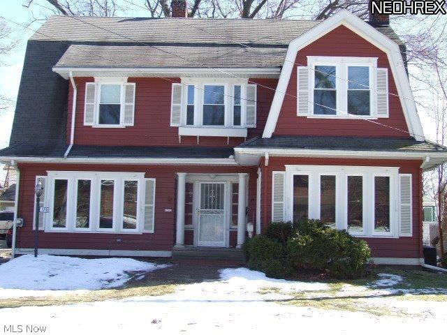 Charming 4BR, 1.5BA Colonial with a lot of original CHARM retained! Huge fireplaced living room, formal dining room with built-in corner china cabinet with leaded-glass doors, eat-in, updated kitchen, large sun room and half-bath on first floor. Second floor has 4 large bedrooms, full bath, large hallway between rooms with a window-seat alcove. There is a grand, curved stairway, some original light fixtures, spacious foyer, hardwood floors and many other things that retain the original charm this house was built with. There is a large, 2-room attic that could be turned into livable space or used for additional storage. All windows, including basement, were replaced within the last year, along with C/A. 1st floor half-bath and 2nd floor full bath have been updated. 2-car detached garage, Home Warranty. See it today! Home needs waterproofed and has some termite damage, probably needs to go cash or 203K. Great potential!!
