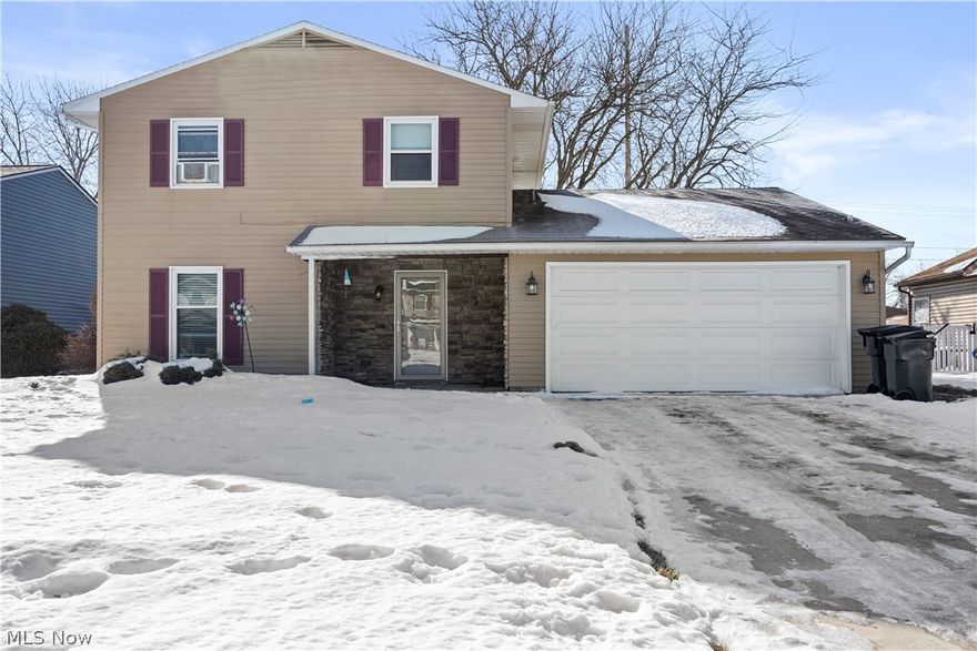 Nestled in one of Elyria's most requested locations and conveniently placed minutes from major access points including I-90/254, LCCC! You'll also appreciate the close proximity to parks, golf courses, shopping and schools. Nicely appointed exterior with a stone accented covered front porch. Foyer entry with an extra deep coat closet and there’s a storage closet under the staircase. Living room opens to the dining and kitchen! Modernized kitchen is crisp and clean with an updated backsplash and countertop. Family room with beamed ceiling. First floor laundry. Enclosed rear patio enclosure. First floor offers a smaller sized 4th bedroom that would also work as the perfect work from home space! Upstairs you'll find three nice sized bedrooms. The owner's bedroom has full bath access. The yard is extra deep measuring 178ft in depth and the backyard is fenced!