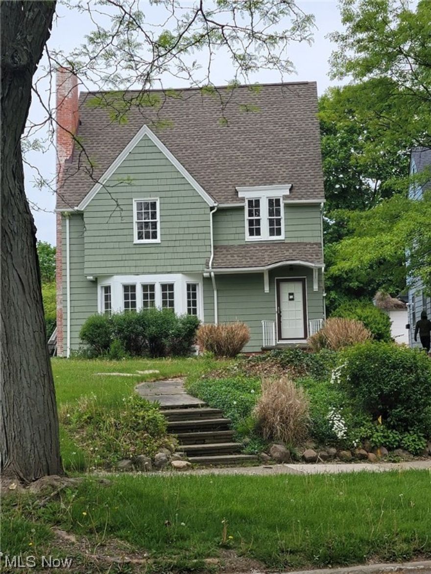 Welcome to 18305 Lomond Blvd in Shaker Heights, where you can mix urban and suburban living. This colonial has much to offer, from its refinished original hardwood flooring throughout to the gorgeous remodeled kitchen, from custom white cabinets to dolomite countertops, laminate flooring, and an exposed chimney that captivates your attention. The living room has a fireplace and bay window, which let in plenty of natural light~ dining room runs openly into the kitchen and the back patio—three bedrooms upstairs on the second floor plus 4th bedroom on the third floor. With updated bathrooms on the main floor and upper level.