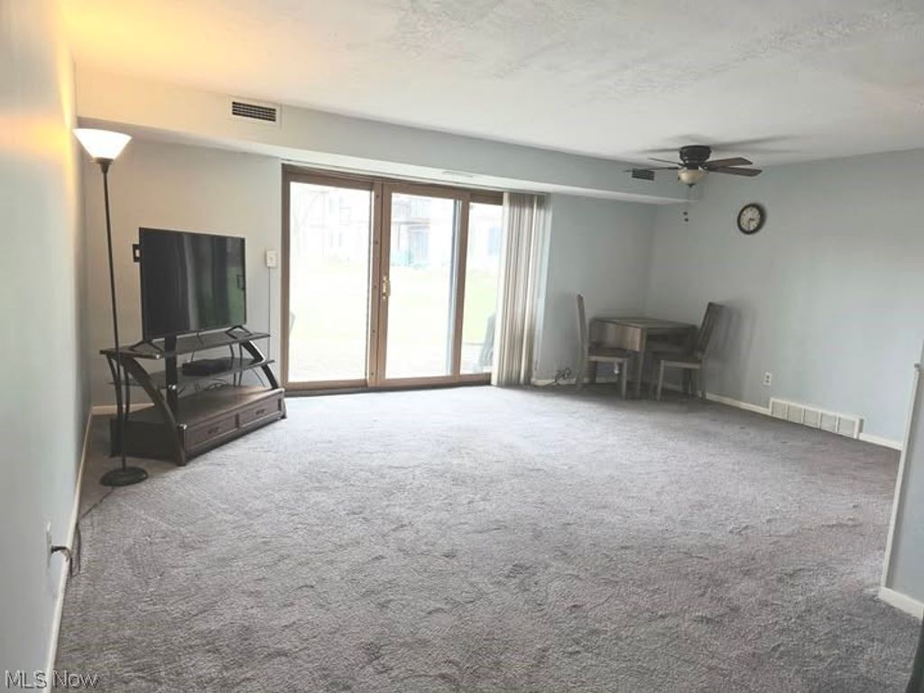 Photo of 9660 Cove Drive #F-16, North Royalton, OH 44133 (MLS # 5193512)