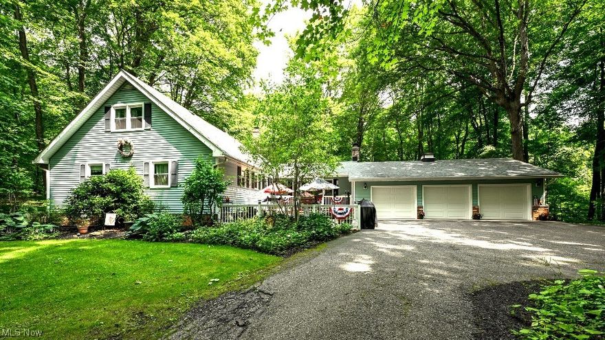 Enjoy peace and tranquility in this sprawling 5 bedroom/4 bathroom, 4,914 square foot home by the Cuyahoga River. A real gem, nestled in the wooded 2-acre private property, you'll be surrounded by nature and enjoy lots of privacy. Not to mention the views from every window. As you  Enter, a 16'x9' foyer with hardwood floors and a closet. The large 20'x14' dining room features a wood-burning fireplace and hardwood floors. The kitchen features a breakfast bar, pantry & appliances. The first floor continues into the extensive great room and on to 3 bedrooms, including the 18'x12' owner's suite. First-floor good size laundry room and office/mud room that leads to a two-tier deck. Up to the second level is a sizable loft/library with built-in bookshelves, a full bathroom, and two sizable bedrooms (one used as a sitting area). To the lower level, you enter a spacious entertainment room with a bar,  built-in refrigerator,  and pool table. A playroom area can easily be converted into a media r