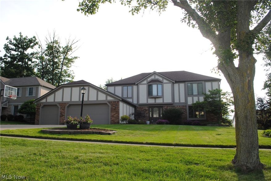 Look no further because you have found IT! You will fall in love as soon as you walk into this stunning 4 bed 3.5 bath High Point colonial! As you enter the front door you will find beautiful hardwood floors that lead you into the completely remodeled kitchen. Fully appointed with stunning granite counter tops, beautiful wood soft close cabinets, stainless steel appliances, built-in double ovens, tons of cabinet and counter space, top of the line stove top, and a beautiful barn pantry door! The family room has hand-scrapped hickory floors, custom stone surrounding the gas fireplace, and a 55" Samsung smart TV! French doors lead to your new office with vaulted ceilings and one of two decks!  You will find 3 generous sized bedrooms, a full bath with double sinks, granite counters.  The master bedroom has vaulted ceilings, a brand new master bath with a huge walk-in shower, double sinks, granite counters, and a walk-in closet with built-ins. Finished 1550 sq ft walk-out basement with a th