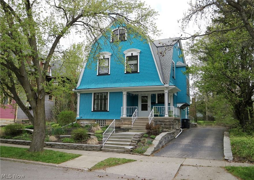 Beautiful Dutch colonial with history, character and charm, within walking distance to downtown and campus. A terraced front garden with perennials, and welcoming front steps lead to a beautiful covered front porch which overlooks the neighborhood and street. The front doorway opens to a central foyer that is characteristic of the charming historic aesthetic of the entire home, with meticulous craftsmanship and architectural details, built-ins, hardwood floors, crown moldings, oak-trimmed doors and full-height windows offering plenty of light and ventilation. The downstairs offers great entertaining spaces with two living areas, a formal dining room and a huge eat-in renovated kitchen with a center island and plenty of storage. A double staircase leads to the second floor with three bedrooms and a common bath, including a huge master suite with an attached, generously sized bathroom. An attic door leads to a finished three-season attic with an opportunity to increase your living areas
