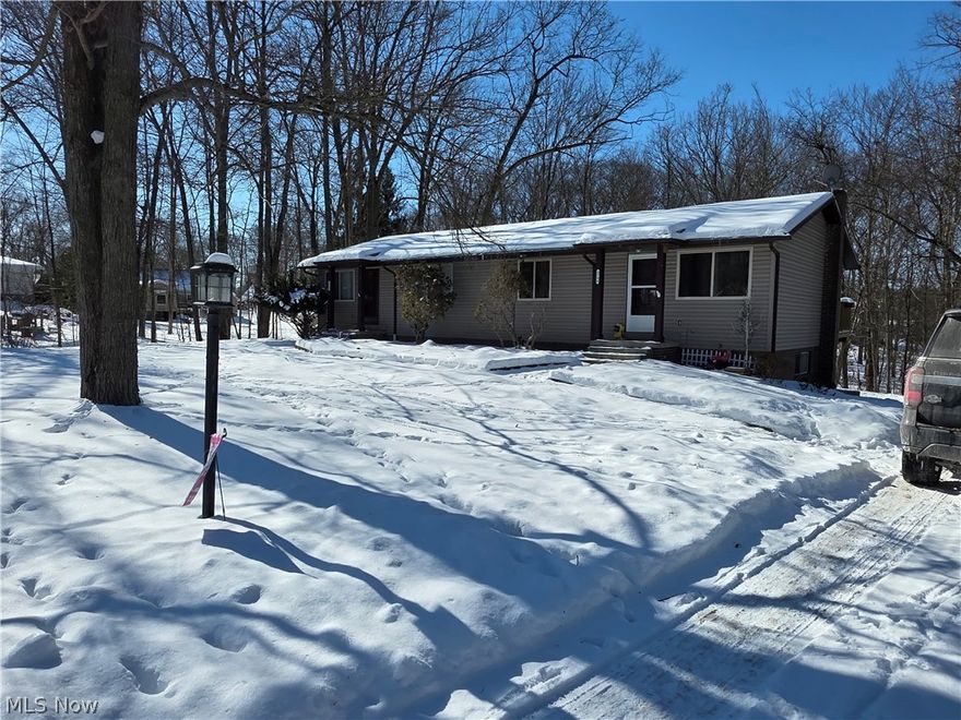 Welcome to this darling, well maintained raised ranch duplex in the heart of Stow! 2 bedrooms, 1.5 bathrooms, living room, kitchen and dinette on the main floor per side with family/rec room, half bathroom, laundry/utility room and huge, extra deep 1 car garage rounding out the walk-out basement level! One side has 2 tiered stunning deck, with parking underneath, while the other has an amply balcony. Plenty of parking space. With nearly a half acre lot, you will enjoy serenity, nature and deer in the back yard! Once those trees fill in you will have amply privacy too! Newer windows and some newer appliances. Nothing to do but start your income producing investment or occupy one side and let the tenant contribute to your mortgage! Close to dining, shopping and highways. Don't wait, schedule your showings today!