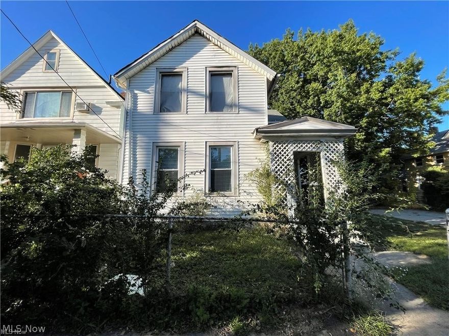 Investment opportunity blocks away from Gordon Sq Arts District/Detroit Shoreway. 3 bedroom/1 bath property. Bring your ideas, property is in need of full rehab. Double wide lot, including front driveway and rear alley access. Option to renovate as a single family or duplex, plans in supplements. Option for lot split as well.  House has fire damage on second floor. Quiet dead end street of Madison East of W 65th. Directly across from the W 65th RTA Rapid station. Eco-Village, South of Bridge area is continually being developed.Within minutes to Edgewater Park Beach, Gordon Square restaurants, theaters, coffee shops and so much more!