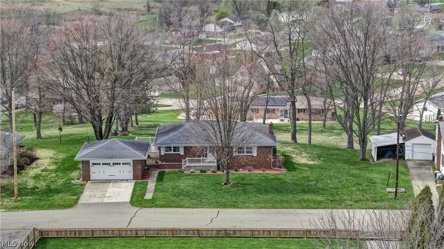 Welcome home to this well-maintained 3-bedroom, 2-bath brick ranch built in 1966, offering modern comfort in a friendly neighborhood. The main floor offers a kitchen, living room/dining area, 3 bedrooms and 1 updated full bathroom. The walk-out basement offers an entertainment area, laundry room, office room, bathroom and storage room. Outside, enjoy the deck attached to the home overlooking the back yard and a detached 2-car detached garage with extra space for a workshop or storage. Schedule your showing today.