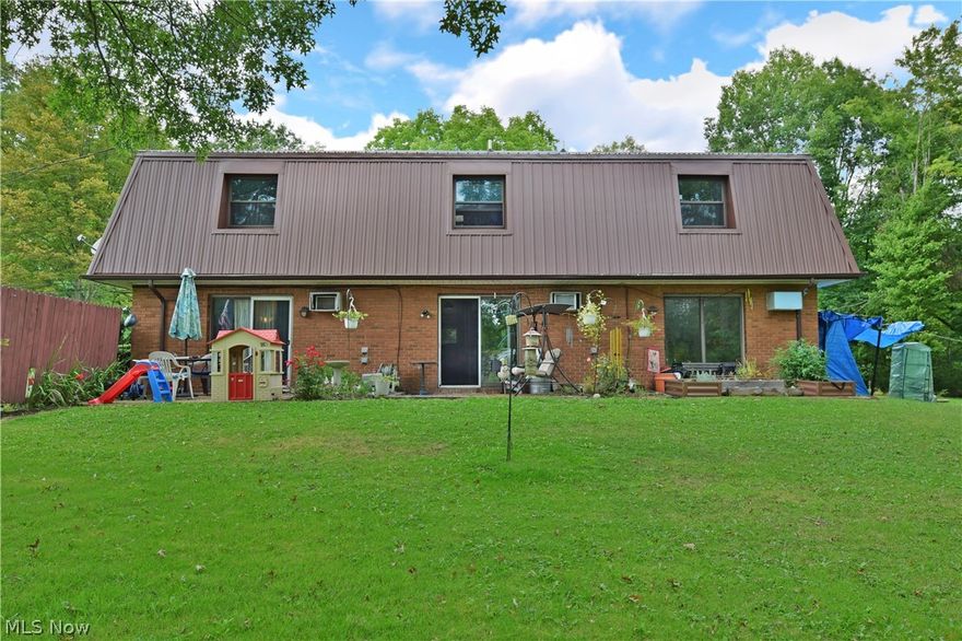 A fantastic investment opportunity located in a beautiful Kinsman location! This expansive, tree line property is home to a fantastic tri-plex residence; brick faced and topped with a robust steel roof. A large gravel lot ensures plenty of parking; while behind, each residence enjoys rear patio space. Inside, each layout contains a kitchen along with a generous carpeted living room with sliding glass doors. Each main hall contains a half bath, while opposite first floor laundry services are located. Upstairs, a pair of relaxing bedrooms span the floorplan and are joined by additional closet space and a full bath. The third unit is currently move-in-ready and recently renovated with a ton of updates to include a wonderfully revamped kitchen and hardwood style flooring. Call today for more information!