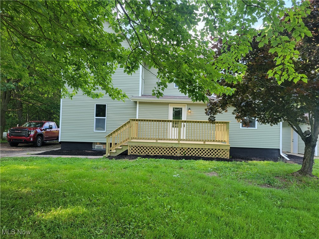 Just what many people are asking for a home in the country with some acerage. Here you have a completley remodeled home with living room, kitchen, dining area,laundry room and master bed room with full bath plus another half bath on the main floor. Upstairs you will find 3 more bedrooms and a full bath. You have a 26 x 32 garage with new doors and openors with remotes. Among some of the features are new siding, windows,doors,new furnace and air conditoner, pressure tank ,all new bathrooms, new kitchen cabnets with quartz counter tops, new dishwasher and all new flooring, carpet and paint. All this sets on a very nice level usable 6 ac. lot, with plenty of road frontage ,room for a huge building or a mini farm for your animals. Water and sewer has been inspected lately .Home may be purchesed with less acrage if wanted.