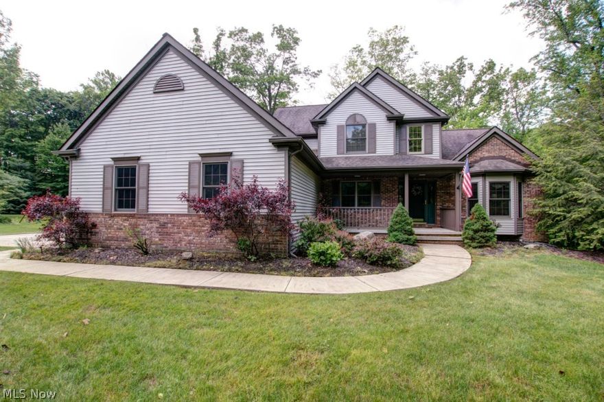 Prestigious custom Amish-built 4 bedroom 3.5 bath Colonial in premier Chardon location, where you can enjoy the beauty of the country with the comfort and convenience of the city. Serenity abounds on this private 3 acre cul-de-sac setting. The home features oak trim throughout with wide molding on the first floor, beautiful stone gas fireplace in family room, dining room with crown molding and tray ceiling.  First floor master suite w glamour bath featuring double sinks, and two walk in closets. 12 course walk-out basement with full bath, laundry room lined with cabinets, 3 car side entry garage.  The garage also has private stairway to basement. Spacious eat-in-kitchen which features Kraftmaid cabinets, an island, all appliances stay (Stainless Steel), and slider that leads to a beautifully re-finished deck. Roof has trusses that are 16” on center and 2’ ice guard on eaves.  The well is 325 feet deep with crystal clear water that does not require water softeners.