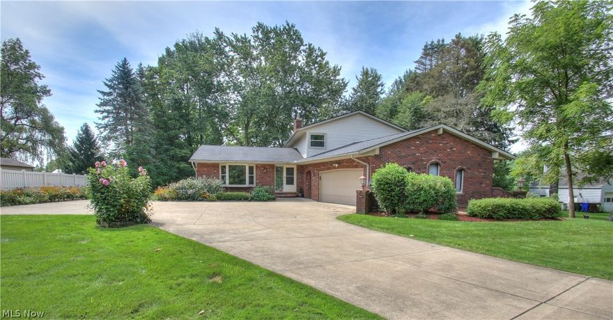 Welcome home to this meticulously maintained spacious 4 bedroom 3 bath split level centrally located in beautiful Bath Ohio, and offering many updates! Sitting on 1.42 acres, this home boasts over 2,900 Sq Ft and is great for entertaining with its open floor plan and extra-large living spaces. Step down into the large family room and enjoy a built-in wet bar, fireplace and sliding glass doors that lead out to the backyard, which has a deck, patio with a built in fire pit and pond. Bathroom recently updated with new vanity and granite countertop. Master suite is enormous and has ample closet space, master bath with a newly tiled shower, sliding glass doors leading to the deck, and a fireplace to keep you warm on those cold winter nights. Don’t miss this great opportunity because it won’t last long!