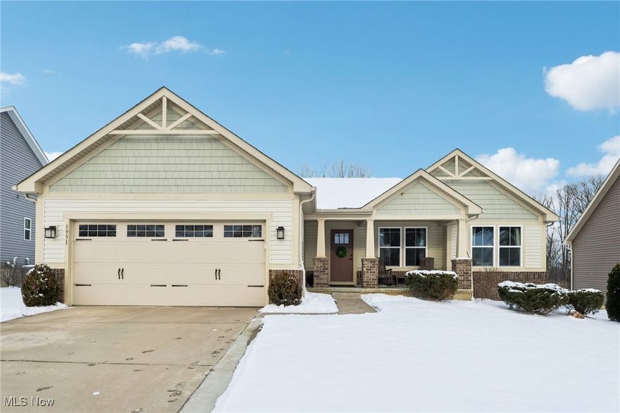 Welcome to this beautifully maintained 4-bedroom, 3-bath ranch in the desirable Woodland Villas community in Cuyahoga Falls, situated on .25-acres in the Woodridge School District!  

This newer built home offers over 2,700 square feet of finished living space, including a finished lower level with a family room/recreation room, 4th bedroom, a full bathroom, egress window, and abundant storage space.  

The open-concept main level features sweeping ceilings, hardwood flooring, an arrival center, a spacious great room, bright and airy dining room, and a gourmet kitchen.  

The kitchen features an expansive center island/breakfast bar, extensive cabinetry, quartz countertops, stainless steel appliances, and a sliding glass door leading to a rear covered porch, overlooking the sprawling backyard with a wooded backdrop.  

Retreat to the owners' suite, which includes an en-suite bathroom with double sinks, a walk-in shower with dual showerheads, and a walk-in closet.  

Additional features include a covered front porch and a first-floor laundry.  

An extra wide driveway leads to the attached, 2-car garage. 

Enjoy the great outdoors at the nearby Cuyahoga Valley National Park, Sand Run Metropark, and Seiberling Nature Center! There is a future Towpath Trail connector which adds convenience! 

Located near dining, shopping, and major expressways, this property truly is one to appreciate!