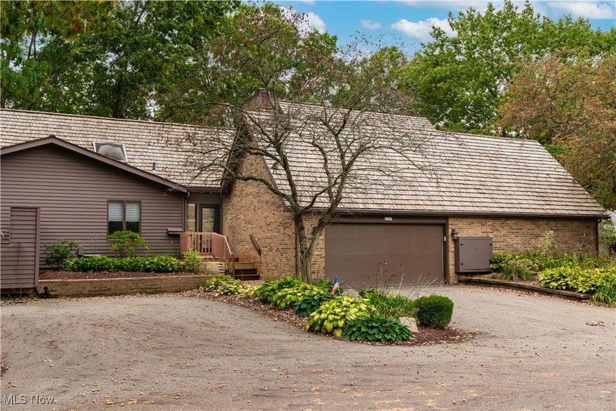 Welcome to this beautifully secluded condo nestled among mature trees in an exclusive community of only 18 units. Fully renovated with over $150,000 in upgrades, this home exudes modern elegance and convenience. Every detail has been thoughtfully updated, including items like fresh professional paint, sleek quartz countertops, new flooring, contemporary light fixtures, cabinetry, high-end appliances, epoxy flooring in the garage and a 2 year old roof. The main level offers an open and inviting layout, with a great room that leads to a private upper deck, also accessible from the primary bedroom. The primary suite features a dual-access bathroom shared with the second bedroom, providing both functionality and privacy. A new shower enclosure and plumbing fixtures further enhance this space. Additionally, a versatile bonus area above the primary bedroom is perfect for a home office, studio, reading alcove or any multitude of uses. The walkout basement expands your living space with a large recreation room,  an exercise area and a built-in jacuzzi, ideal for entertaining or unwinding after a long day.  Enjoy the lock-and-go lifestyle with outdoor maintenance managed by the association. Located in the heart of Jackson Township, this condo combines sleek, big-city style with the tranquility of nature. It's just minutes from parks, shopping, and dining, making it the perfect retreat without sacrificing convenience. Some rooms virtually staged. Auditor indicates there are 3 bedrooms; but Seller states 2 bedrooms.