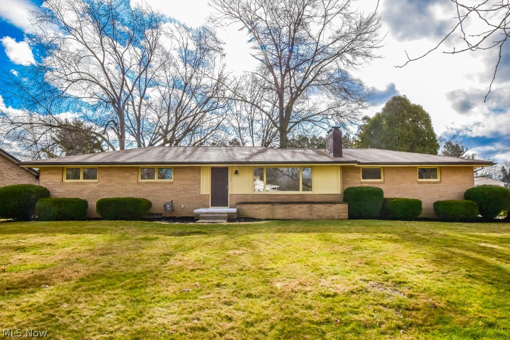 Exceptional 4 bedroom, 3 full bath brick ranch in Jackson schools! The beautifully updated main level features a living room with a gas log fireplace with full wall brick surround and luxury vinyl plank flooring that continues throughout much of the home. Be the 1st to prepare meals in the brand new kitchen with granite countertops, soft close dovetail cabinetry, stainless steel appliances and subway tile backsplash. Engage with friends and family in the dining area and then move the party to the amazing sunroom with floor to ceiling windows and secret murphy door passage to the finished lower level. Three bedrooms and two remodeled full baths are on the main floor including the master bedroom with an en suite bathroom featuring a shower with tile surround. 1st floor laundry hookups add ultimate convenience! Enjoy family time in the lower level rec room with new carpet and a 2nd cozy fireplace. You'll also find the fourth bedroom and another full bath with a shower. Outside amenit
