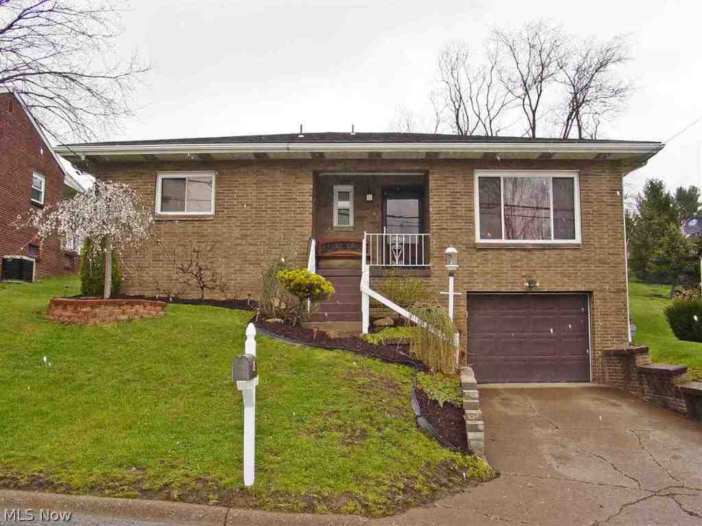 READY TO GO!! Remodeled 3 BR, 2 BA brick ranch home with updates galore! Master BR addition w/ bath, fenced yard, new roof, new oak kitchen, updated flooring throughout! Beautiful brick gas log fireplace, finished rec room & more!