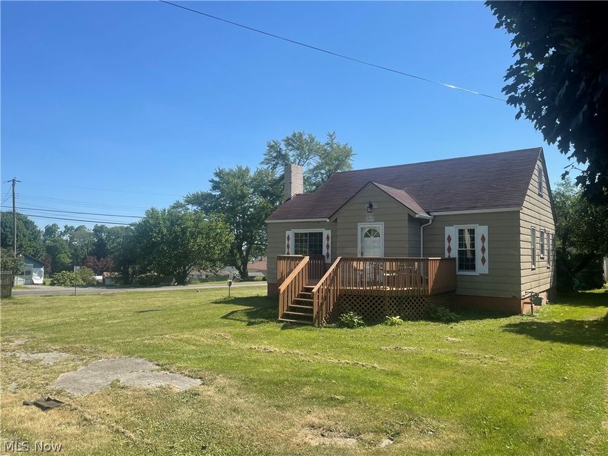 Charming A-Frame home hosts 3 Bedrooms, a living room with real hardwood floors and a wood burner, a master bedroom with real hardwood floors as well as a large bedroom upstairs.  The wood burner works as it should for all your heating needs. and is backed by gas forced air heat.  New windows, new hot water tank, new gutters and a new outside electrical box have all been completed in the last 5 years. Central Air throughout the main floor of the home.  Window air unit for bedroom upstairs.  House roof is approx. 10 years old and a metal roof was installed in 2022 on the side porch. 2+ car detached garage includes 220 electrical service and concrete floors. Additional city lot is included for whatever you may want.... room for a swing set, outdoor fireplace,  swimming pool, additional garage... the possibilities are endless!  Call today for a special tour!